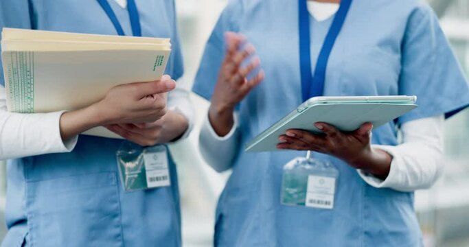 Hands, doctors and discussion with report in closeup, corridor or tablet for results, analysis or health in clinic. Medic team, document and advice in hospital for strategy with info, review or admin