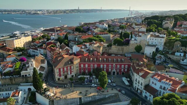 Aerial view of Alfama district in Lisbon. Houses and streets of the oldest quarter of Lisbon - Alfama and view to river Tejo