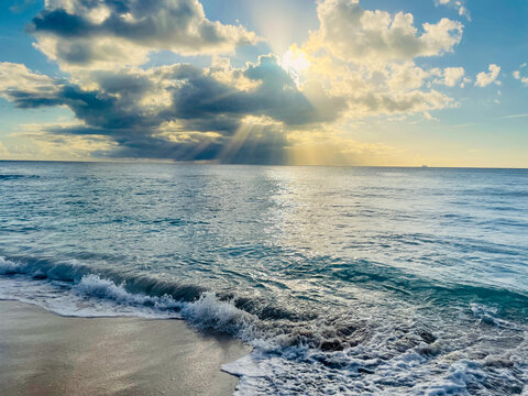 sunset over the sea with clouds