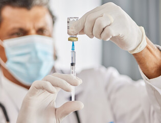 Healthcare, vaccine and closeup of a doctor with a needle for a flu, cold or allergy treatment. Professional, injection vial and zoom of male medical worker with a vaccination syringe in a clinic. - obrazy, fototapety, plakaty