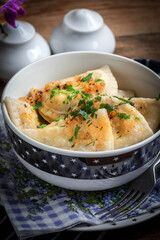 Dumplings with meat, onion and bacon.