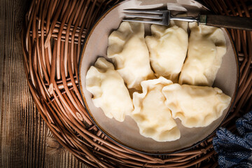 Fototapeta na wymiar Homemade dumplings with cheese.