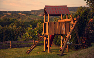 Playground in the sunset. - 628087789