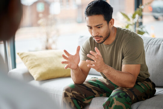 Therapist, Soldier And Man Talking, Support And Counseling For Military Trauma, Mental Health And Memory Of War. Speaking, Therapy And Young Veteran Or Army Person With Psychologist Helping On Sofa