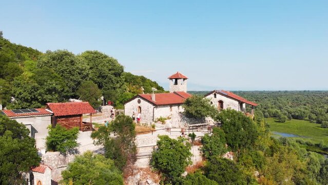 Monastery Kom in Skadar lake. Serbian Orthodox monastery in Montenegro. Religious and tourist attraction of Montenegro.