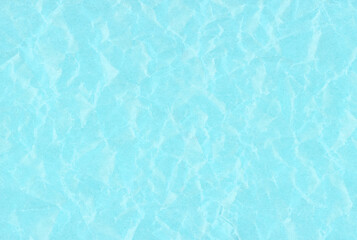 A background like a water surface made by crumpling light blue paper and spreading it.