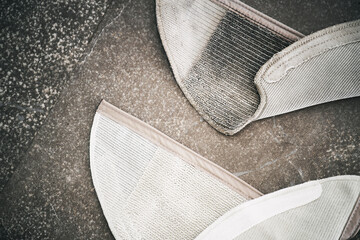 Mop and HEPA dust filter replacement for robot vacuum cleaner. Duster spare parts replace. Modern housekeeping accessories concept.