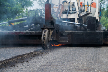 Road burners use heat to melt old surfaces before mixing with new asphalt. using high heat