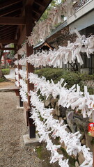 Many paper origami filled with love and wishes at a temple in Kobe Japan