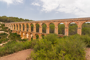 Fototapeta na wymiar Old Roman Aqueduct in Tarragona
