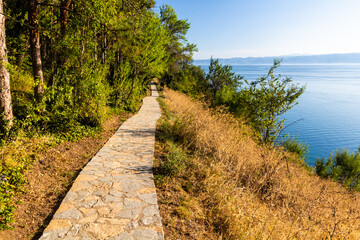 Walking path along Ohrid lake near Ohrid town, North Macedonia