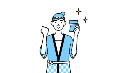 預金通帳を見て喜ぶ夏祭りの法被を着た女性