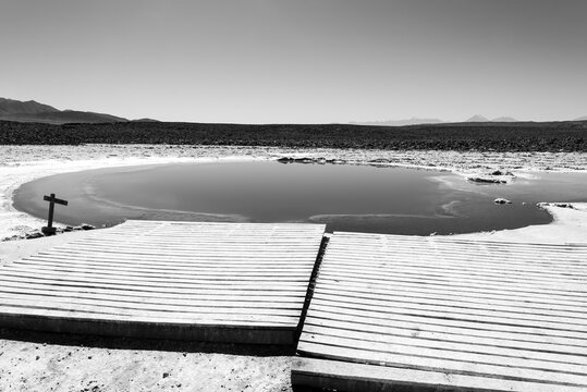 Black and white photo of Baltinache hidden lagoon in Atacama desert