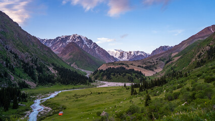 a river in a beautiful mountain gorge. the green gorge. summer mountains