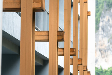 Obraz na płótnie Canvas Concrete beam structure of the modern desinged building exterior. Building part object photo.