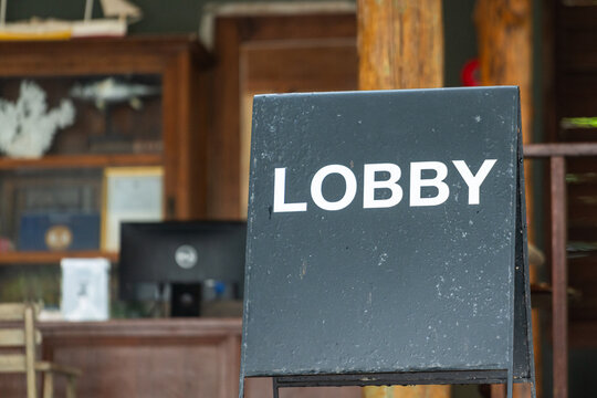Hotel "Lobby" signboard which is made from black metal, design as retro stype. Sign and symbol object photo.