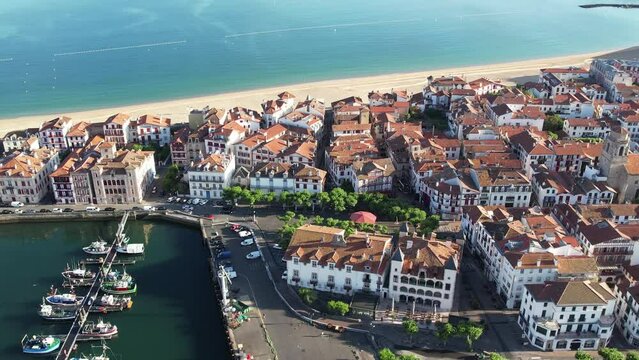 Aerial fly over above the french village of Bayonne during summer