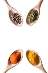 Spoons with spices, herbs and seasonings isolated on transparent white background