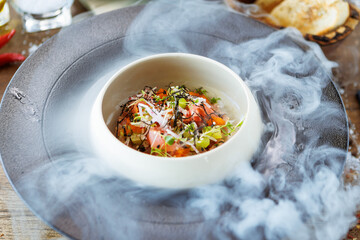 Tuna tartare. Ponzu sauce, chives, cucumber, masago and nori. Delicious healthy Italian traditional food closeup served for lunch in modern gourmet cuisine restaurant