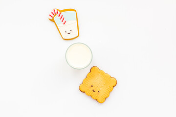 Homemade funny biscuits with milk for kids, top view. Breakfast with milk