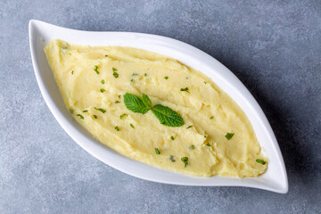 Serving of creamy mashed potato made from boiled potatoes