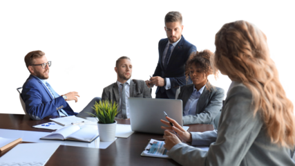 Group of modern business people in formalwear discussing business and smiling while sitting in the office