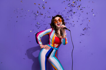 Photo of carefree cool lady wear striped overall dark glasses singing songs discotheque isolated purple color background