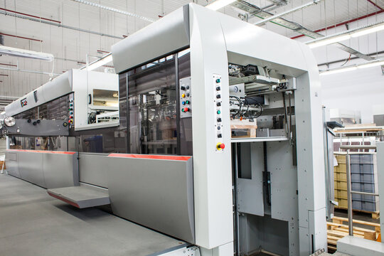 The equipment for a press. Offset machine at the printing manufacturing. Printing machine