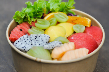 fruit and vegetable salad or apple, dragon fruit and lettuce salad