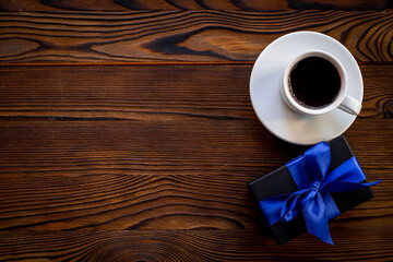 Gift box with blue ribbon for Happy Fathers day. Greeting card concept