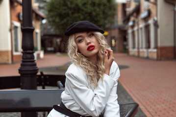 Fototapeta premium Autumn with a blonde in the old town