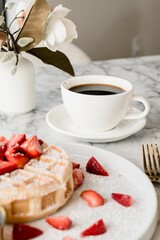 breakfast with coffee and waffles