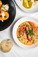Lobster Risotto in a White Bowl