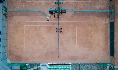 Aerial view of tennis game on court top view
