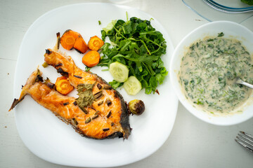 Preparing fresh nice fish in kitchen at home