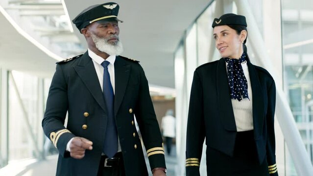 Travel, pilot and air hostess talking at the airport before boarding a flight in the city. Conversation, communication and hospitality air crew team speaking about a strategy in an urban town hotel.