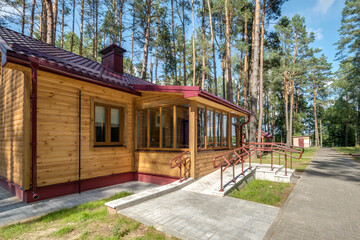 wooden eco country houses in forest