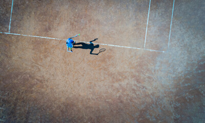 Aerial view of tennis game on court top view