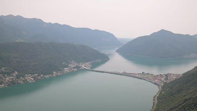 Panoramic aerial view, from the top of San Salvatore mountain, on Lake Lugano and surroundings, Switzerland