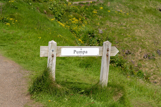 Sign for the Pumpa viewpoint in Arnarstapi on the Snaefellsnes Peninsula in Iceland. A geological feature of a ravine along the coast