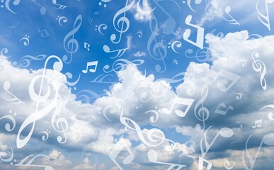 Staff with musical notes on blue sky