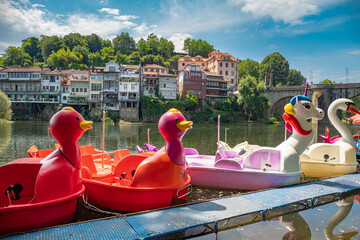 Peddle boats on lake during summer heatwave in Portugal during record setting heat 