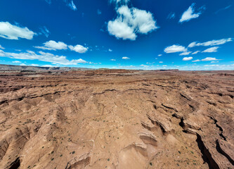 Fototapeta na wymiar Utah Eroded Landscapes from Sandstone carved by Water and Wind forming cliffs and canyons