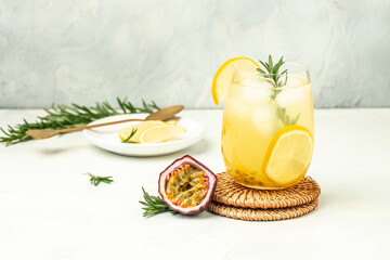 passionfruit cocktail. Tropical drink for summer party. on a light background, refreshing drink or beverage with ice, place for text