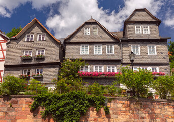 Fototapeta na wymiar Beautiful facades of old German half-timbered houses in Marburg.