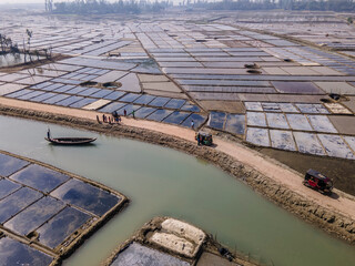 Obraz premium Aerial view of natural salt field on the coast of bashkhali Island in Chittagong, Bangladesh.