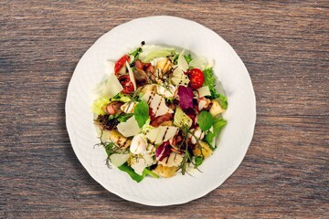 Green fresh salad with vegetables and leaves