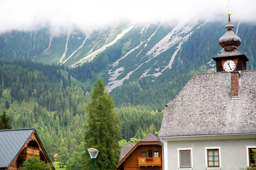 Buildings in Dachstein region in Austria - 628211933