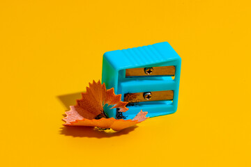 Blue pencil sharpener on table