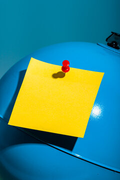 Blue globe with yellow sticker